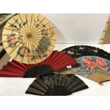 FIVE VINTAGE FANS AND A PARASOL