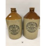TWO LARGE STONEWARE BOTTLES LABELLED CHAPMAN AND P