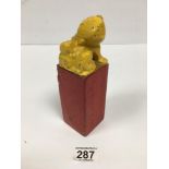 A RARE HEAVY PAINTED STONE CHINESE ARTIST SCHOLAR SEAL STAMP WITH DOG OF FAUX FINIAL, PAINTED IN