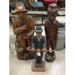 THREE WOODEN CARVED SCULPTURES LARGEST 83 CMS