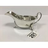 A SILVER SAUCEBOAT RAISED UPON THREE FEET, HALLMARKED SHEFFIELD 1964 BY VINERS, 106G