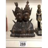 A CARVED SOLID HARDWOOD ORIENTAL FIGURE OF TWO WOMEN, 21CM HIGH