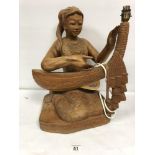 A LARGE CARVED WOODEN FIGURAL LAMP OF AN EASTERN FEMALE 47 CMS