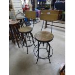 PAIR OF ADJUSTABLE SWIVEL INDUSTRIAL STOOLS