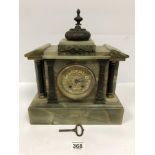 A LATE 19TH CENTURY HEAVY ONYX MANTLE CLOCK, 31CM WIDE