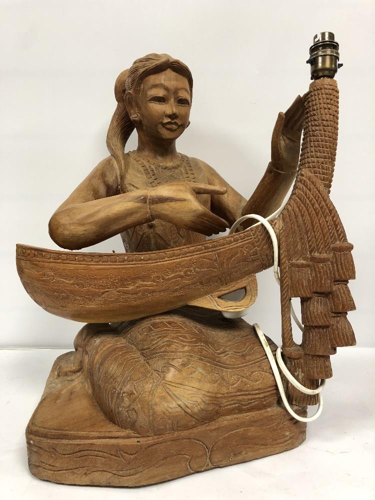 A LARGE CARVED WOODEN FIGURAL LAMP OF AN EASTERN FEMALE 47 CMS - Image 3 of 10