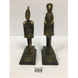 A PAIR OF EGYPTIAN STYLE BRONZE FIGURES, RAISED ON WOODEN BASES, 21CM HIGH