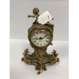 A GILT METAL MANTLE CLOCK BY GLORIA, MADE IN FRANCE, QUARTZ MOVEMENT, 25CM HIGH