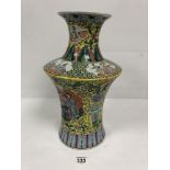 A LARGE CHINESE PORCELAIN VASE HIGHLY DECORATED THROUGHOUT WITH POLY-CHROME ENAMELS, RED CHARACTER