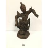 A LARGE CARVED LATE 19TH/EARLY 20TH CENTURY WOODEN FIGURE OF A BUDDHIST DANCER, EACH ARM WITH