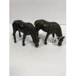 A PAIR OF CAST BRONZE FIGURES OF HORSES, 17CM WIDE