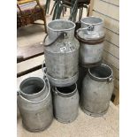 SEVEN GLAVANISED MILK CHURNS