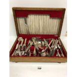 AN EXTENSIVE CANTEEN OF SILVER PLATED CUTLERY IN OAK CASE, INCLUDING KNIVES, FORKS, SPOONS AND MORE