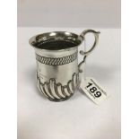 A VICTORIAN SILVER EMBOSSED CHRISTENING MUG, HALLMARKED LONDON 1886 BY JOSIAH WILLIAMS & CO, 110G