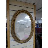 GILDED METAL OVAL MIRROR 52 X 72 CMS