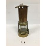 A VINTAGE BRASS MINERS LAMP, 25.5CM HIGH