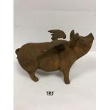 A CAST METAL FIGURE OF A FLYING PIG, 32CM WIDE