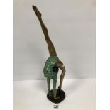 A MODERN BRONZE FIGURE OF A FLEXIBLE DANCING GIRL WITH PAINTED DETAILS THROUGHOUT, 48CM HIGH