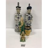 A PAIR OF CHINESE BLUE AND WHITE GLAZED POTTERY FIGURES OF MEN. 33CM HIGH, TOGETHER WITH TWO SMALL