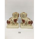 A PAIR OF STAFFORDSHIRE MODELS OF SPANIELS, 22CM HIGH