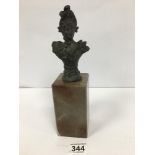 A 19TH CENTURY FRENCH SPELTER BUST OF A WOMAN RAISED UPON A SQUARE MARBLE PLINTH, 28CM HIGH