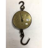 A SALTER TRADER'S SPRING BALANCE WITH BRASS FACE AND VERY LARGE IRON HOOK