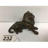 A SMALL LATE 19TH CENTURY BRONZE FIGURE OF A LION, HOLLOW BASE, 11.5CM WIDE
