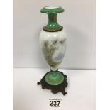 A 19TH CENTURY CONTINENTAL PORCELAIN AND GILT BRASS MOUNTED BALUSTER VASE WITH A PAINTED FIGURE OF A