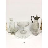 A GROUP OF CUT GLASSWARE, INCLUDING A SILVER PLATE MOUNTED CLARET JUG, DECANTER, CAKE STANDS AND