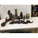A MIXED LOT COLLECTIBLES, INCLUDING CARVED WOODEN PIG, TWO EGYPTIAN STYLE CATS AND MORE