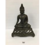 AN ORIENTAL BRONZE FIGURE OF BUDDHA IN A SEATED POSITION, RAISED UPON THREE FOOTED BASE WITH PIERCED