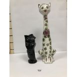 A LARGE CERAMIC FIGURE OF A CAT WITH PAINTED FLORAL MOTIFS THROUGHOUT, 56.5CM HIGH, TOGETHER WITH