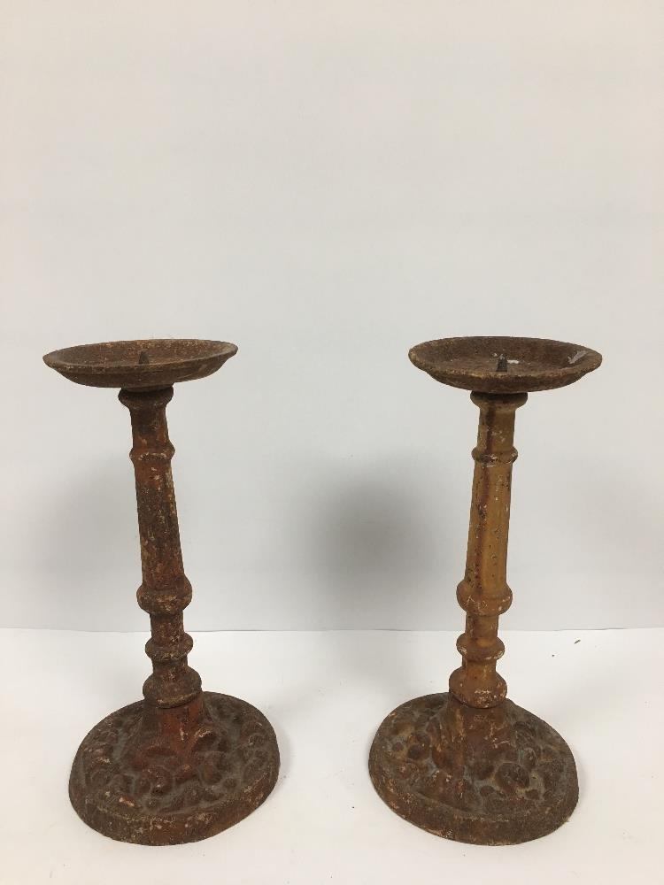 A PAIR OF SMALL HEAVY CAST IRON SPIT CANDLESTICKS, 29CM HIGH - Image 2 of 4