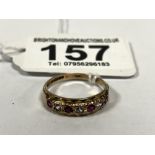 A LADIES 9CT GOLD RUBY AND WHITE STONE HALF ETERNITY RING, SET WITH FOUR RUBIES AND THREE WHITE