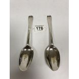 A PAIR OF GEORGE II SILVER TABLE SPOONS WITH RATTAIL HANDLES, HALLMARKS RUBBED BUT APPEAR TO BE