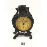 A 19TH CENTURY FRENCH BRONZE MANTLE CLOCK IN THE ROCOCO STYLE WITH GILT DIAL, 26CM HIGH (LACKING