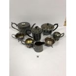A LARGE QUANTITY OF SILVER PLATED TEA WARE INCLUDING A PHILIP ASHBERRY HIGHLY DECORATIVE TEAPOT