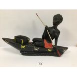 A MID CENTURY CERAMIC FIGURE OF A LADY ROWING IN A BOAT, 50CM WIDE