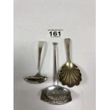 A VICTORIAN SILVER SHELL SHAPED CADDY SPOON, HALLMARKED LONDON 1890, TOGETHER WITH TWO SILVER SIFTER