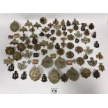 A LARGE QUANTITY OF ASSORTED MILITARY CAP AND OTHER BADGES FROM VARIOUS DIFFERENT REGIMENTS