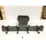A VINTAGE FOUR HOOK COAT RACK WITH WOODEN BACK AND A QUANTITY OF METAL MEAT HOOKS ETC