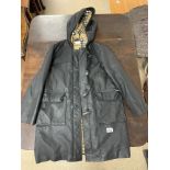 A SMALL SIZE BURBERRY LEATHER DUFFLE JACKET WITH ICONIC BURBERRY LINING AND LABELS, NO APPARENT WEAR