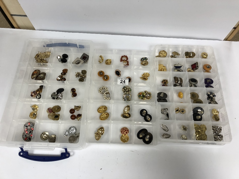 TWO PLASTIC JEWELLERY STORAGE BOXES CONTAINING MOSTLY COSTUME EARRINGS