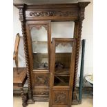 A LARGE CONTINENTAL DISPLAY UNIT WITH CARVED DOORS TO FRONT AND CARVED BOTTOM DRAWER, APPROX 219CM