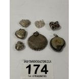 A GROUP OF SEVEN VARIOUS SILVER LOCKETS AND PENDANTS, 21.5G