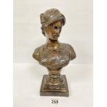 A HEAVY BRONZE FIGURAL BUST OF A SOLDIER, RAISED UPON A PLINTH, 33.5CM HIGH