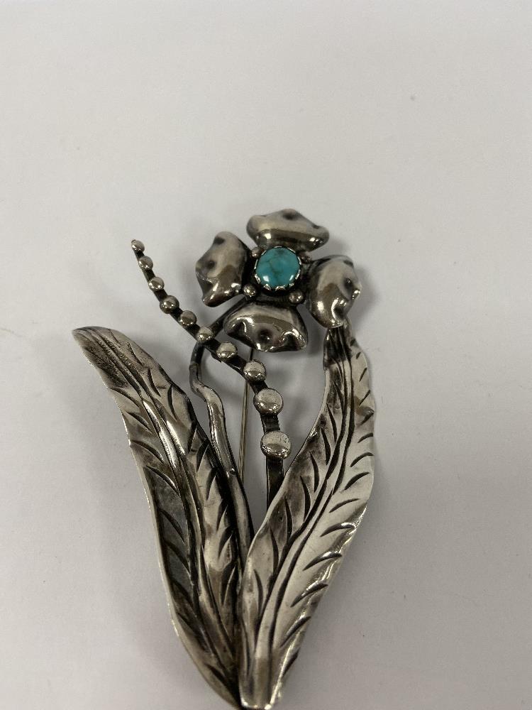 LARGE WHITE METAL AND TURQUOISE STONE BROACH - Image 2 of 2