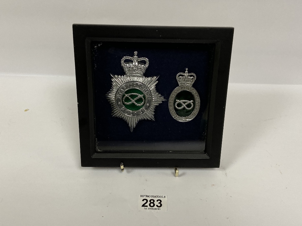 TWO STAFFORDSHIRE POLICE BADGES, BOTH WITH ENAMEL DETAILING, FRAMED AND GLAZED, LARGEST BADGE APPROX