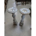 A PAIR OF METAL CANDLESTICKS, 70CMS