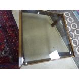 A MID CENTURY SMOKED GLASS COFFEE TABLE, 84CM BY 79CM BY 40CM